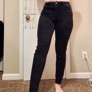 Women's size 28 Forever 21 black faded jeans.